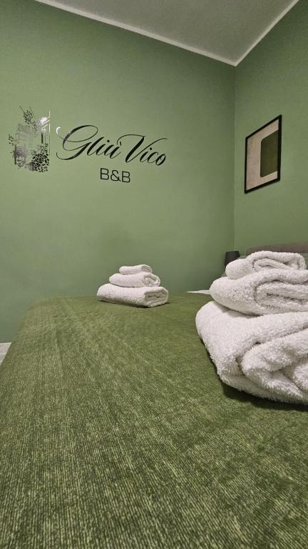Postel nebo postele na pokoji v ubytování Gliù Vico