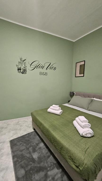 Postel nebo postele na pokoji v ubytování Gliù Vico