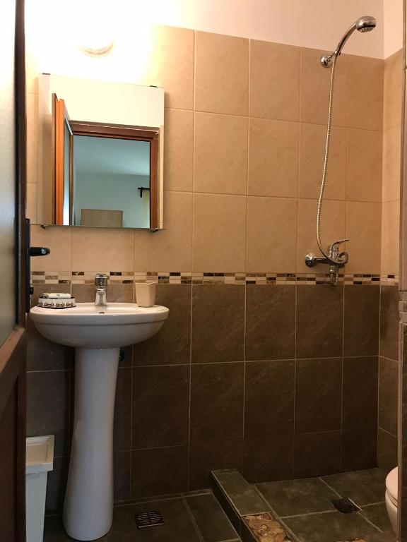 Koupelna v ubytování Vila ALBA AREAL