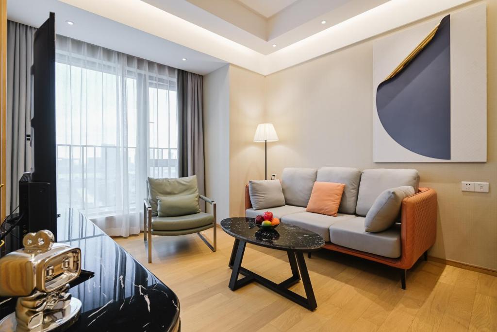 Posezení v ubytování Raffles Executive Apartment - Guangzhou Huijin International Finance Center, Keyun Road Metro Station Branch-Canton Fair Free Shuttle