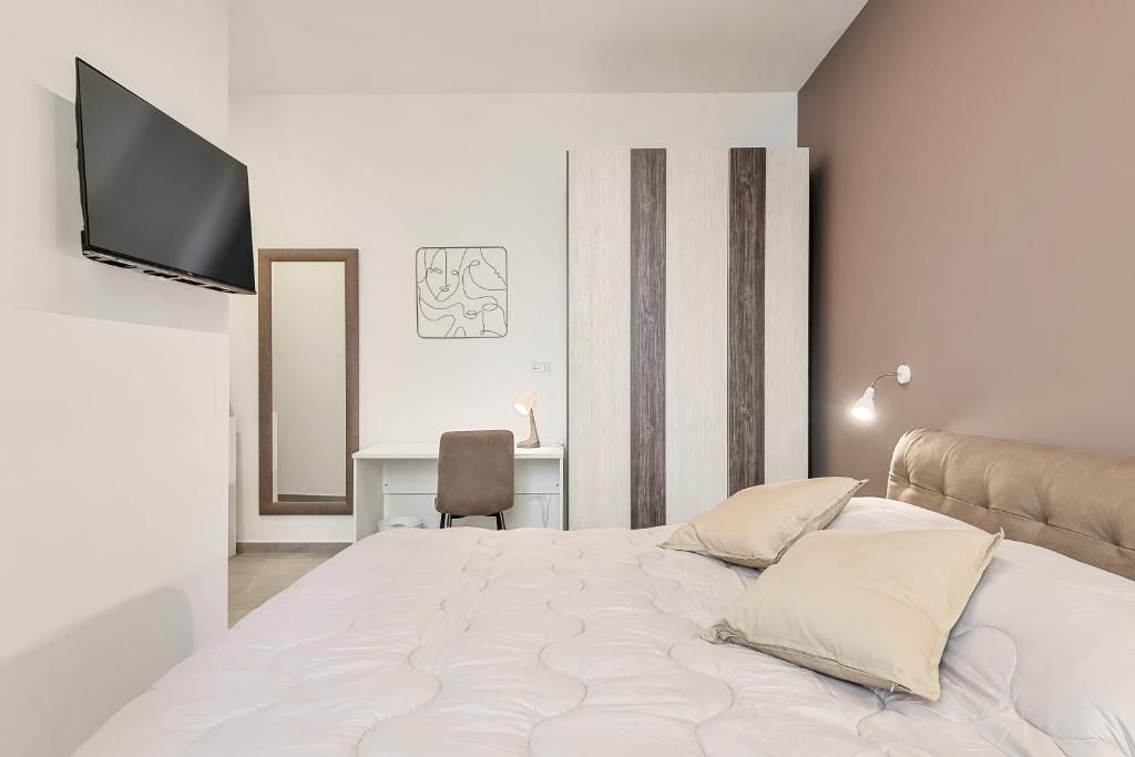 Postel nebo postele na pokoji v ubytování Home 501 Guest House - La Spezia