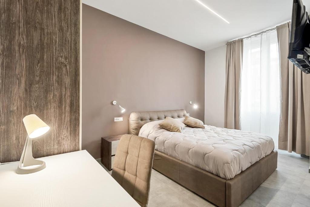 Postel nebo postele na pokoji v ubytování Home 501 Guest House - La Spezia
