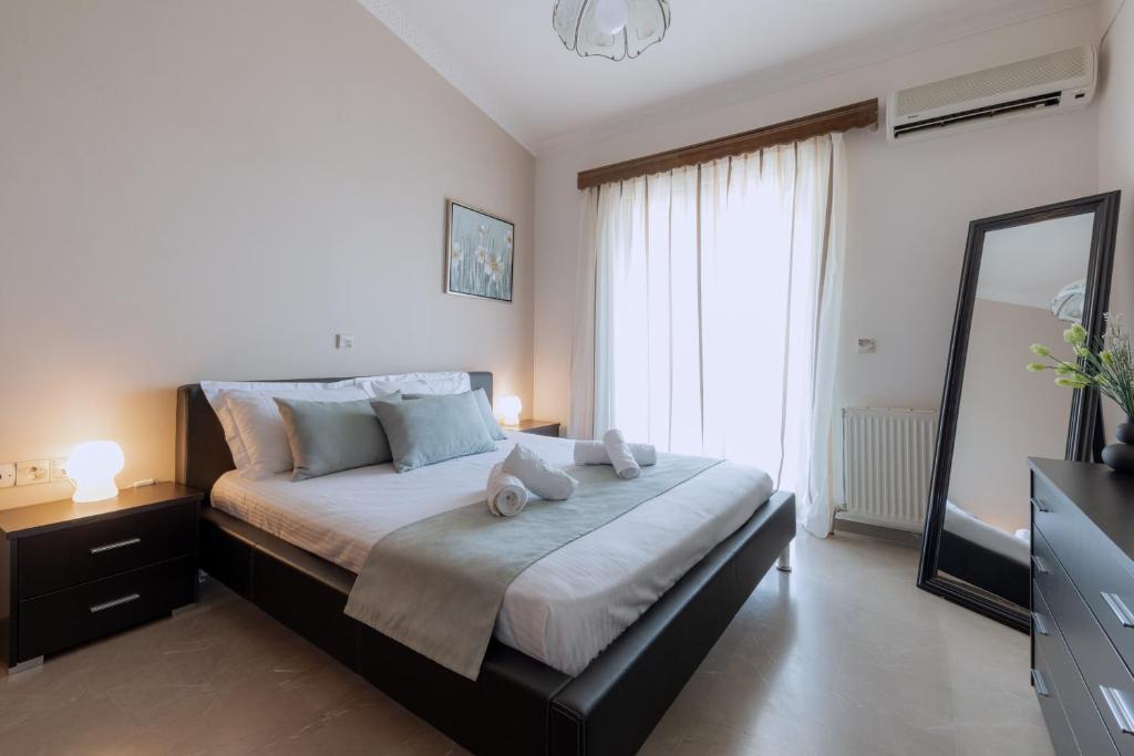 Postel nebo postele na pokoji v ubytování Lala Luxury House
