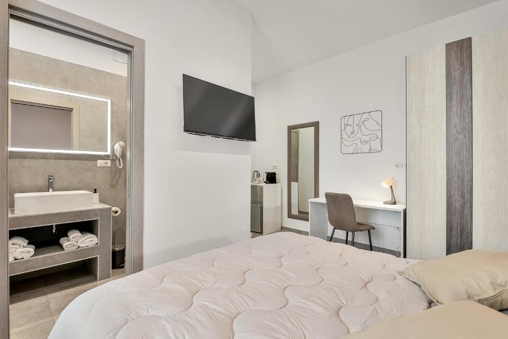 Postel nebo postele na pokoji v ubytování Home 501 Guest House - La Spezia