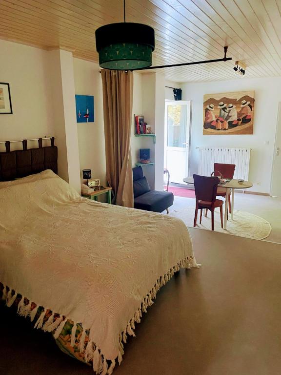 Postel nebo postele na pokoji v ubytování Gîte Tan Rouge