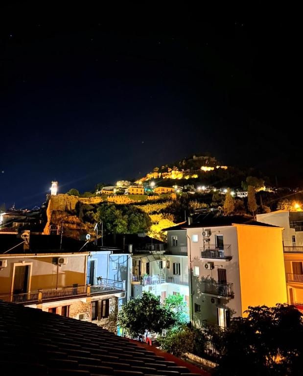 a view of a city at night with buildings at Αρχοντικό Κάββουρα 1890 in Nafpaktos