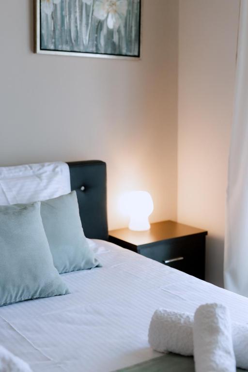 Postel nebo postele na pokoji v ubytování Lala Luxury House