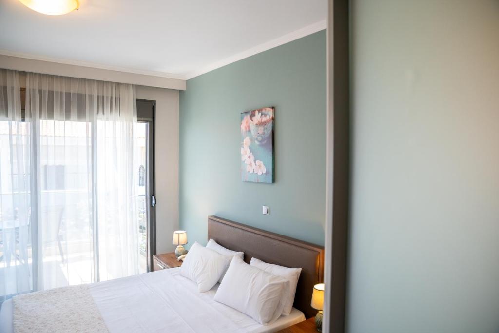 Postel nebo postele na pokoji v ubytování Vellum Luxury Living