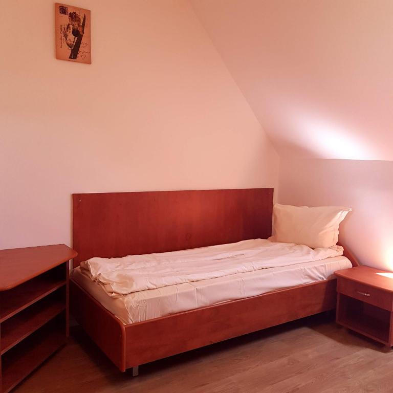 Postel nebo postele na pokoji v ubytování Motel Vector