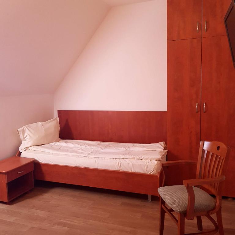 Postel nebo postele na pokoji v ubytování Motel Vector