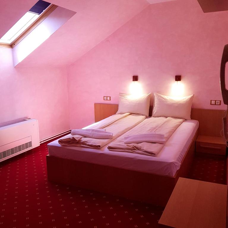 Postel nebo postele na pokoji v ubytování Motel Vector