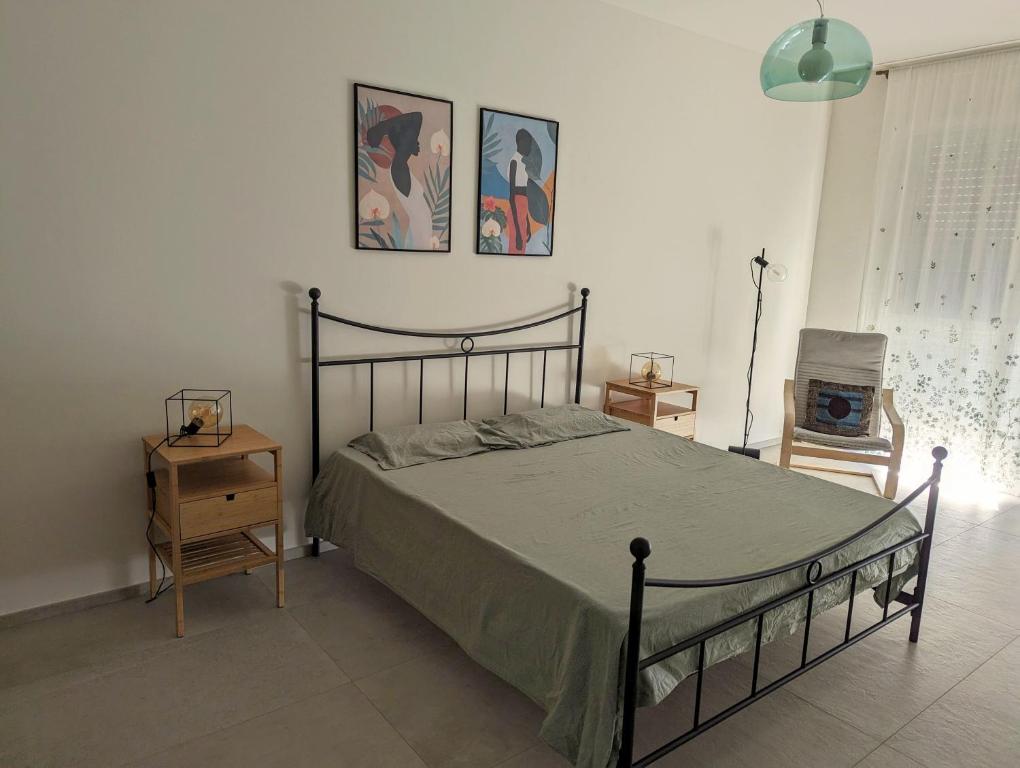 Postel nebo postele na pokoji v ubytování Casa Fontanarosa