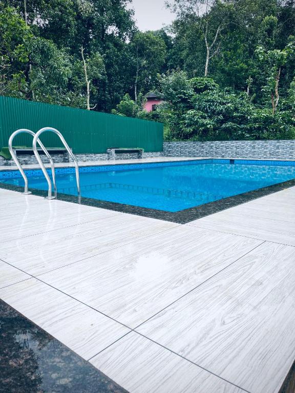 Bazén v ubytování Rivera Holiday Home nebo v jeho okolí