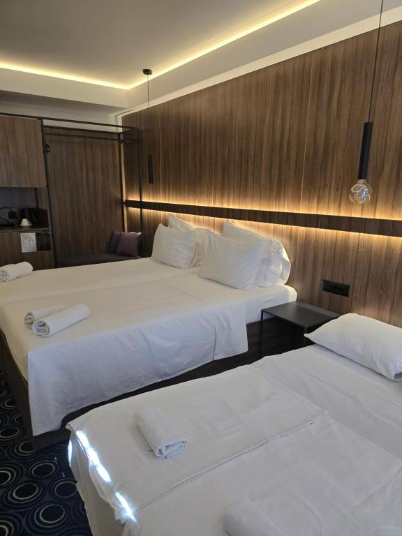 Postel nebo postele na pokoji v ubytování Hotel Carpe Diem