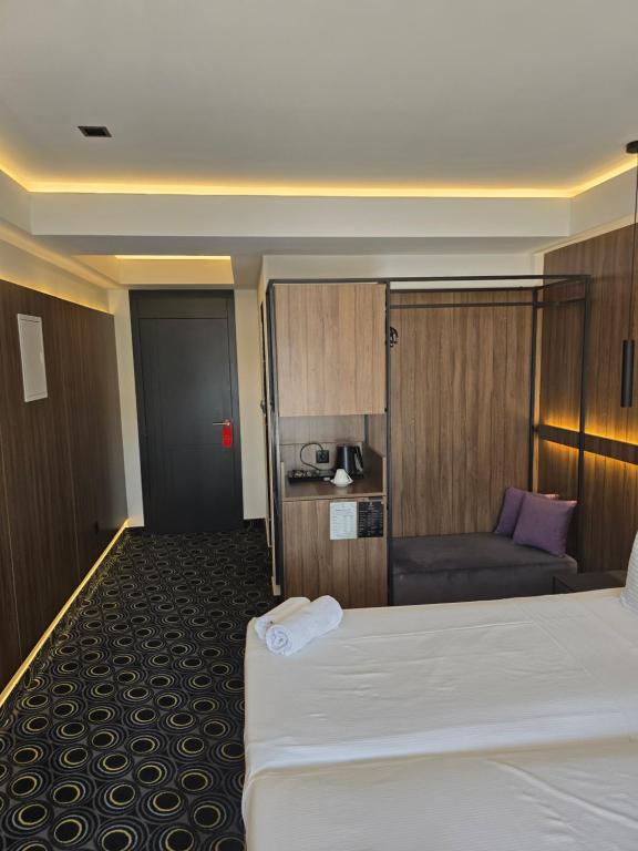 Postel nebo postele na pokoji v ubytování Hotel Carpe Diem
