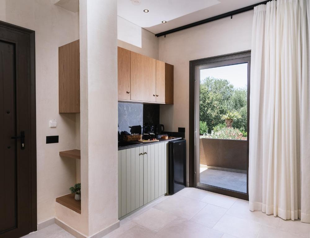 Kuchyň nebo kuchyňský kout v ubytování Idi Hotel