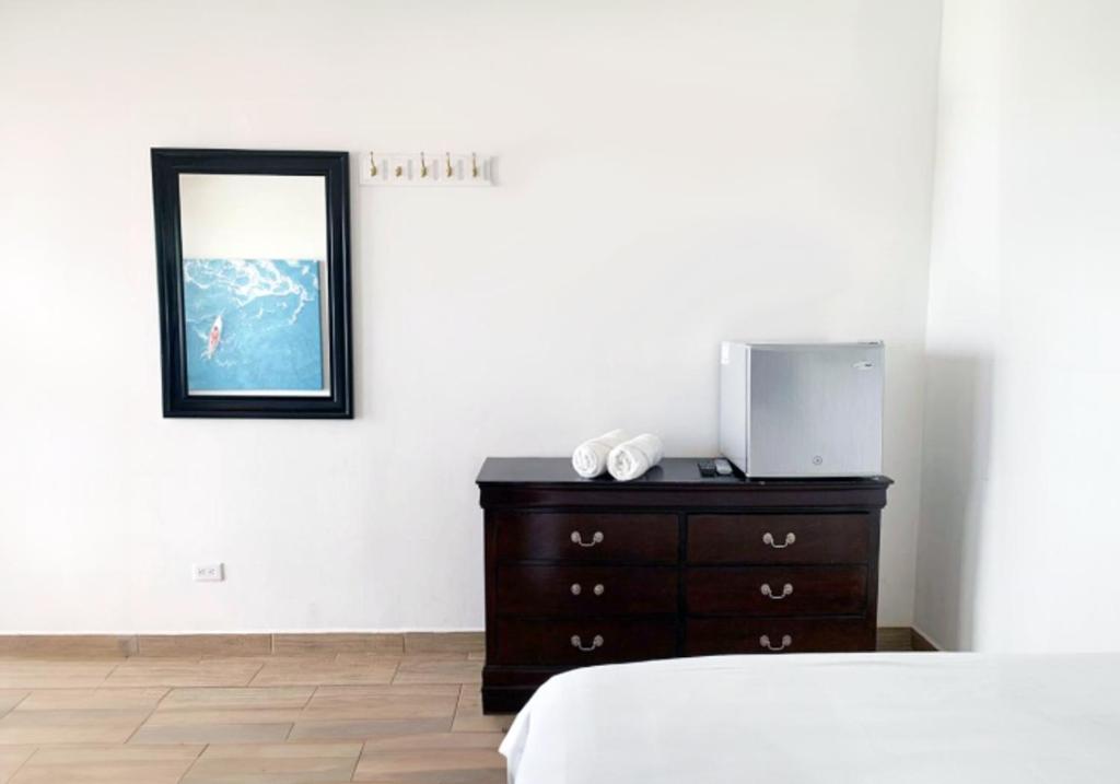 Postel nebo postele na pokoji v ubytování Surf Ranch Tamarindo