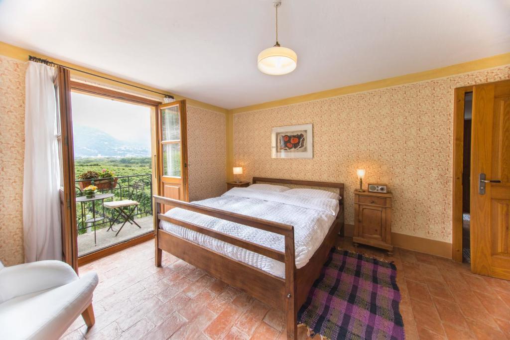 Postel nebo postele na pokoji v ubytování Fattoria l'Amorosa