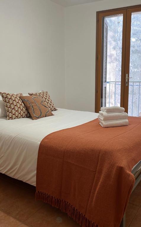 Ένα ή περισσότερα κρεβάτια σε δωμάτιο στο Appartement de charme CARA