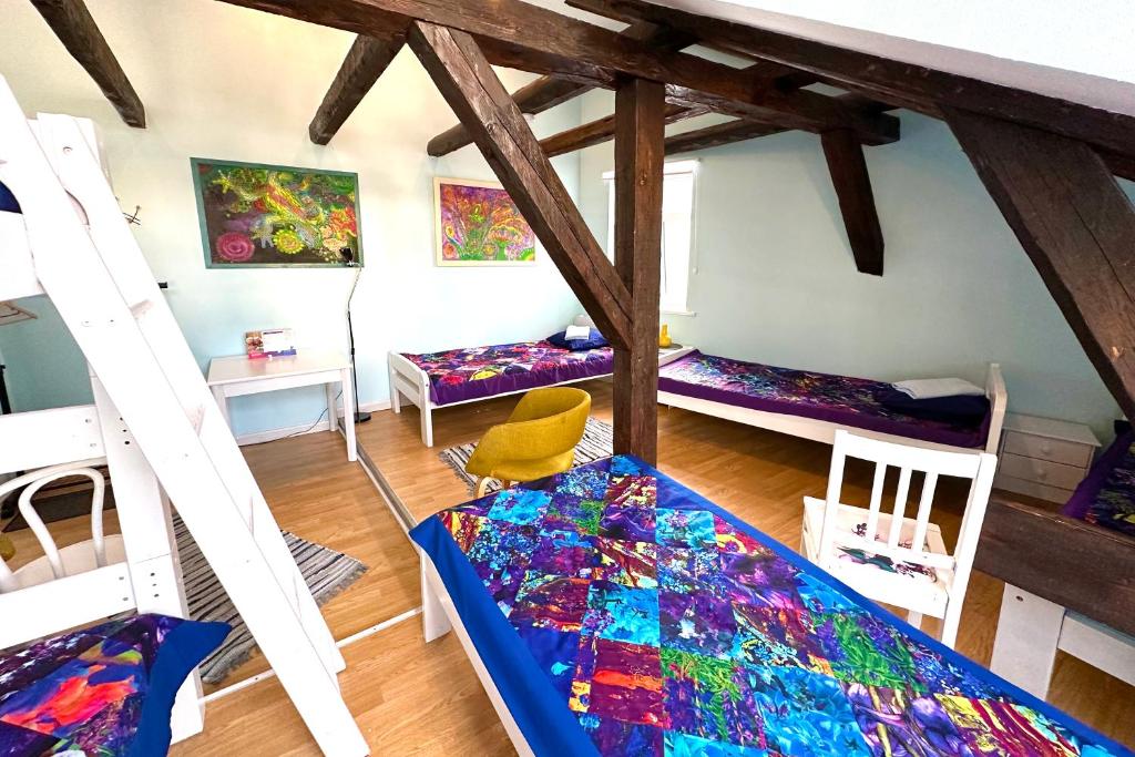Postel nebo postele na pokoji v ubytování Central Hostel