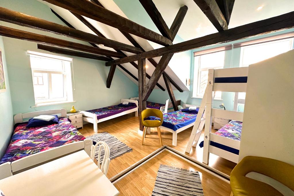 Postel nebo postele na pokoji v ubytování Central Hostel