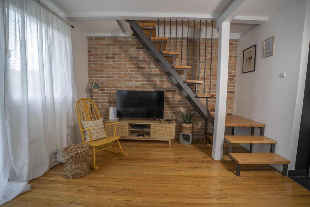 TV a/nebo společenská místnost v ubytování Kuća za odmor Casa Huerta