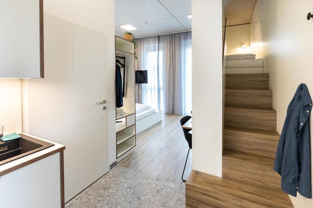 TV a/nebo společenská místnost v ubytování Motel Schlafraum Weng-Dein smartes Hotel-contactless check-In