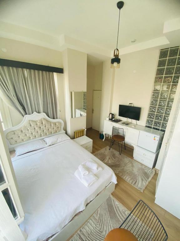 Postel nebo postele na pokoji v ubytování Saklı kosk butık otel