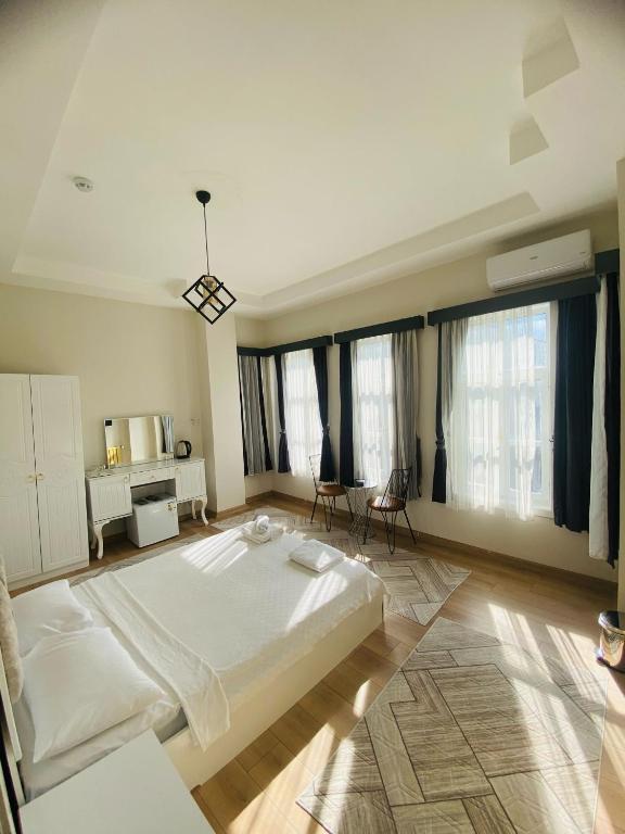 Postel nebo postele na pokoji v ubytování Saklı kosk butık otel