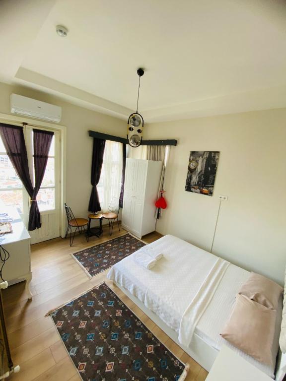 Postel nebo postele na pokoji v ubytování Saklı kosk butık otel