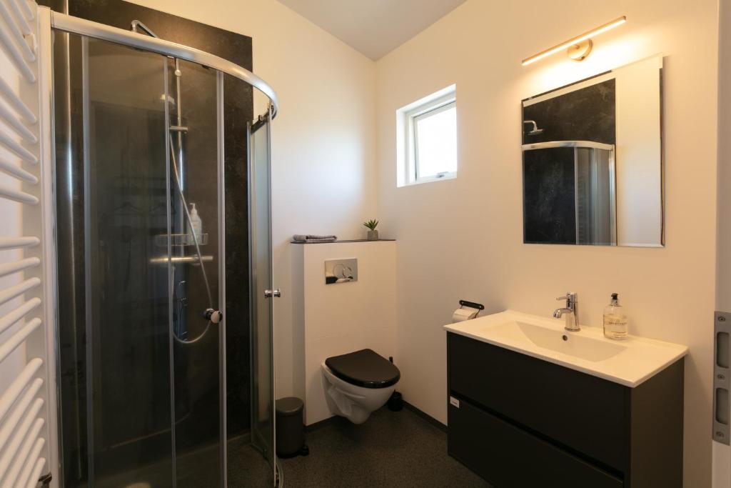 Koupelna v ubytování Karuna Guesthouse