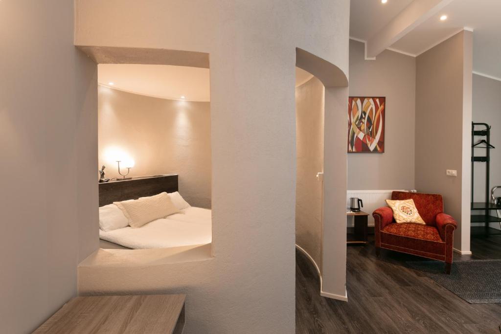 Postel nebo postele na pokoji v ubytování Karuna Guesthouse