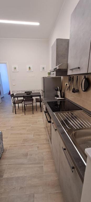 Kuchyň nebo kuchyňský kout v ubytování Il Porto