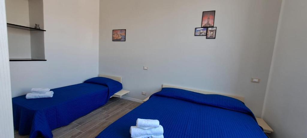 Postel nebo postele na pokoji v ubytování Il Porto