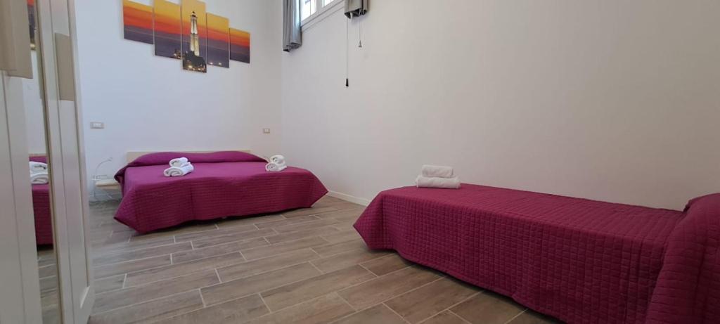 Postel nebo postele na pokoji v ubytování Il Porto