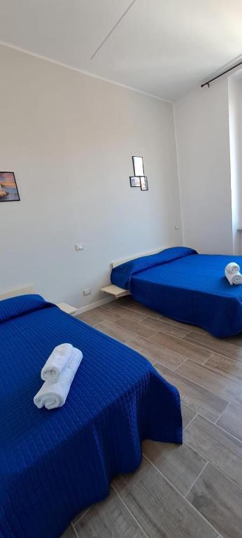 Postel nebo postele na pokoji v ubytování Il Porto