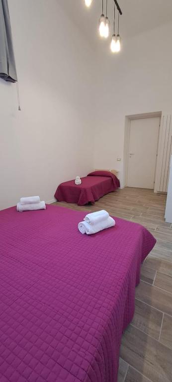 Postel nebo postele na pokoji v ubytování Il Porto