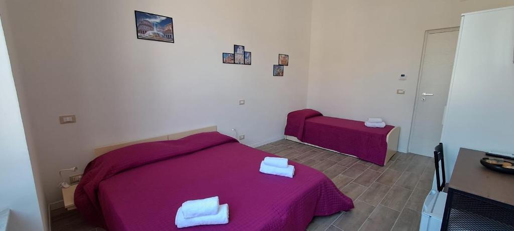 Postel nebo postele na pokoji v ubytování Il Porto