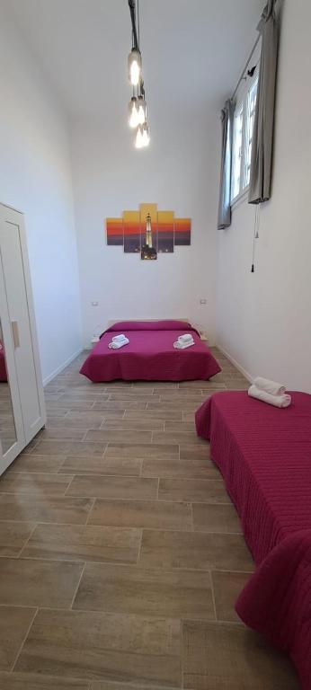 Postel nebo postele na pokoji v ubytování Il Porto