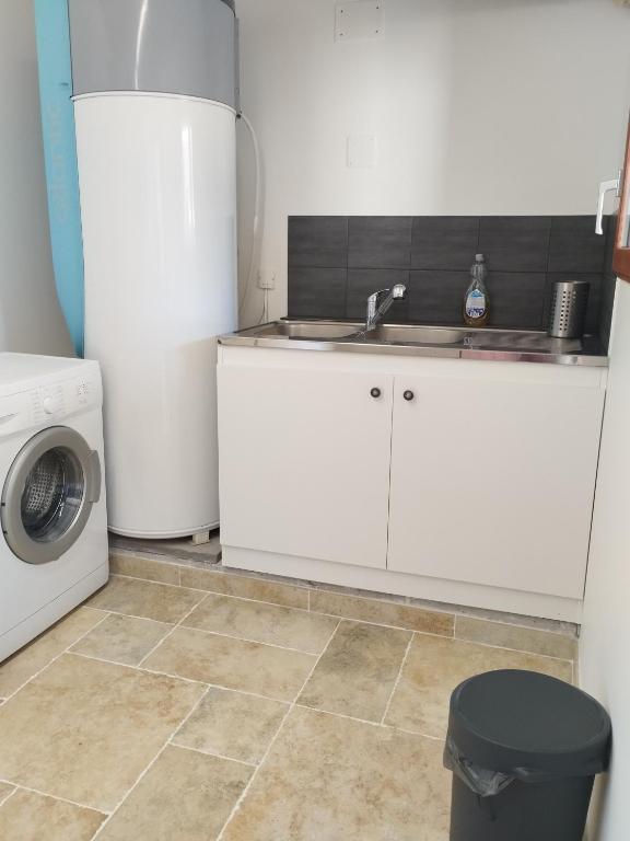 Kuchyň nebo kuchyňský kout v ubytování L'Oratori : chambre La Gabarre