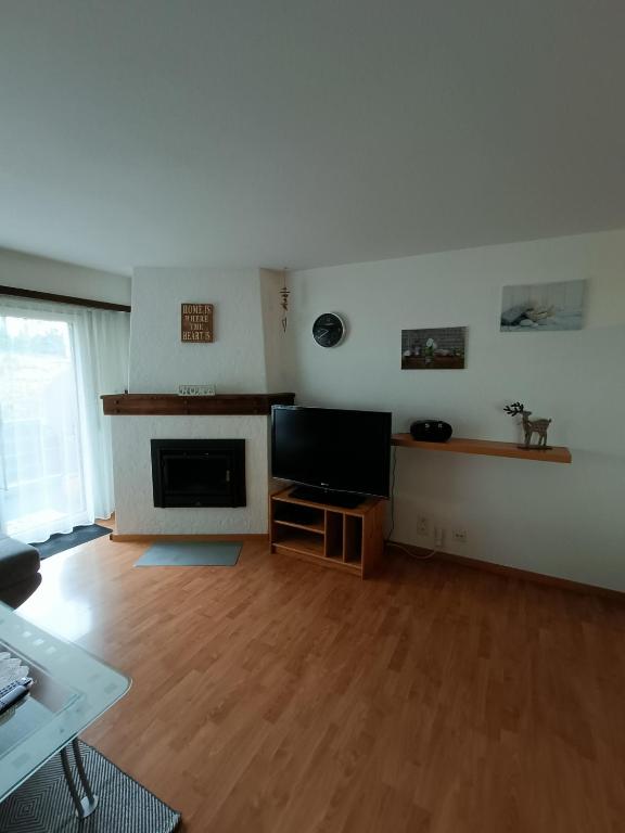 TV a/nebo společenská místnost v ubytování Kummublick Täsch, Nähe Zermatt
