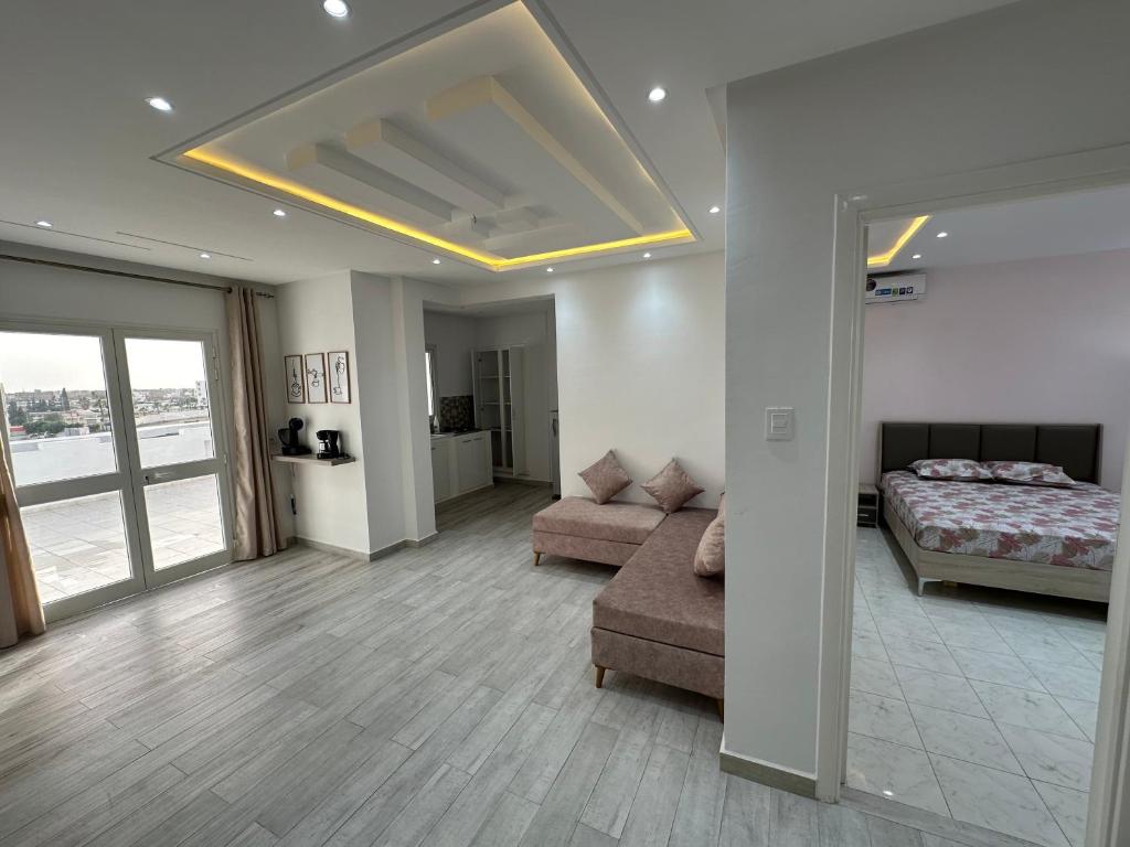 Posezení v ubytování Penthouse Sousse