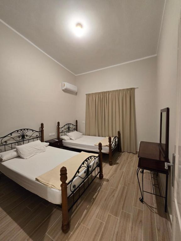 Postel nebo postele na pokoji v ubytování Beit Hashish