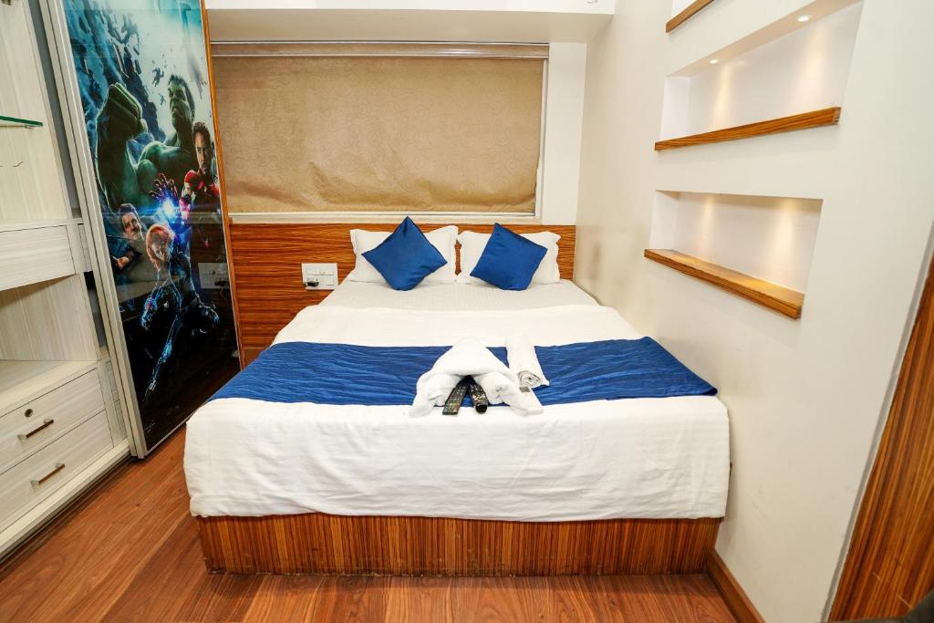 Postel nebo postele na pokoji v ubytování Zenith Homes - Powai Suites
