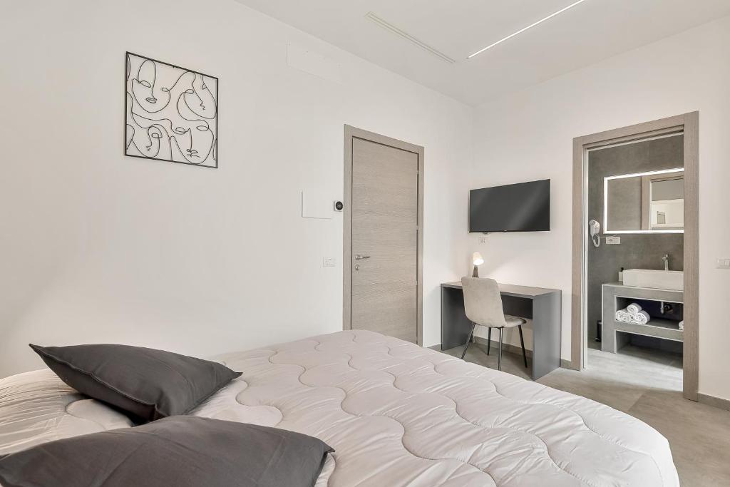 Postel nebo postele na pokoji v ubytování Home 501 Guest House - La Spezia