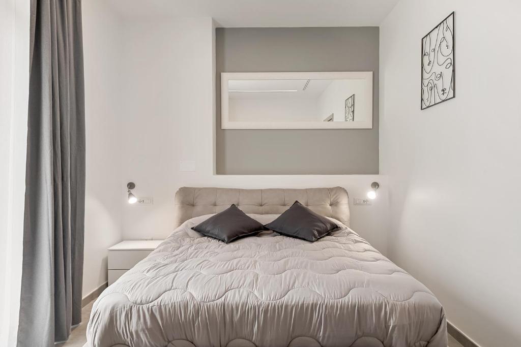 Postel nebo postele na pokoji v ubytování Home 501 Guest House - La Spezia