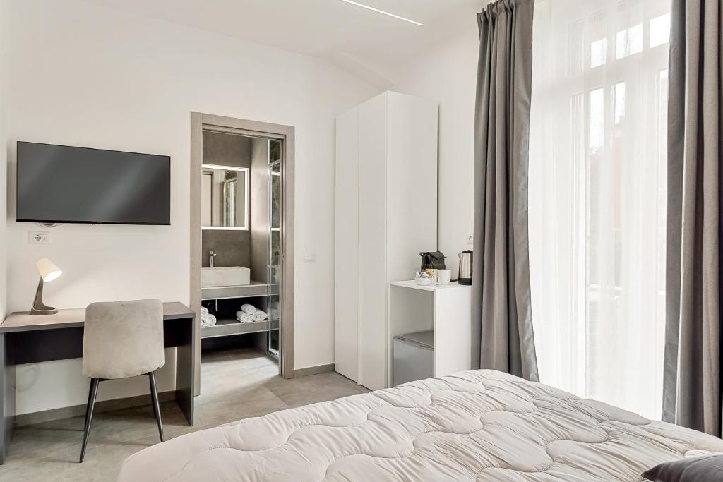 TV a/nebo společenská místnost v ubytování Home 501 Guest House - La Spezia