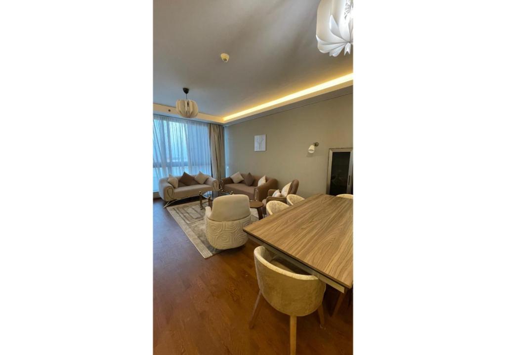 Posezení v ubytování Furnished Apartment in Mall Of Arabia Towers , AEON Compound