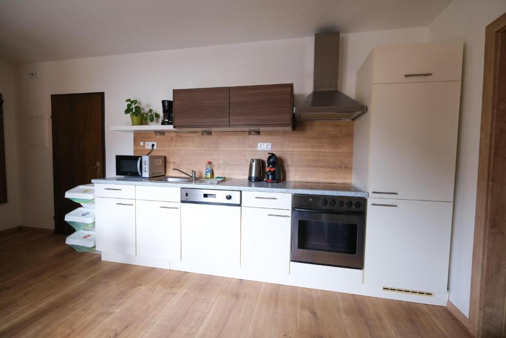 Kuchyň nebo kuchyňský kout v ubytování Haus Simona