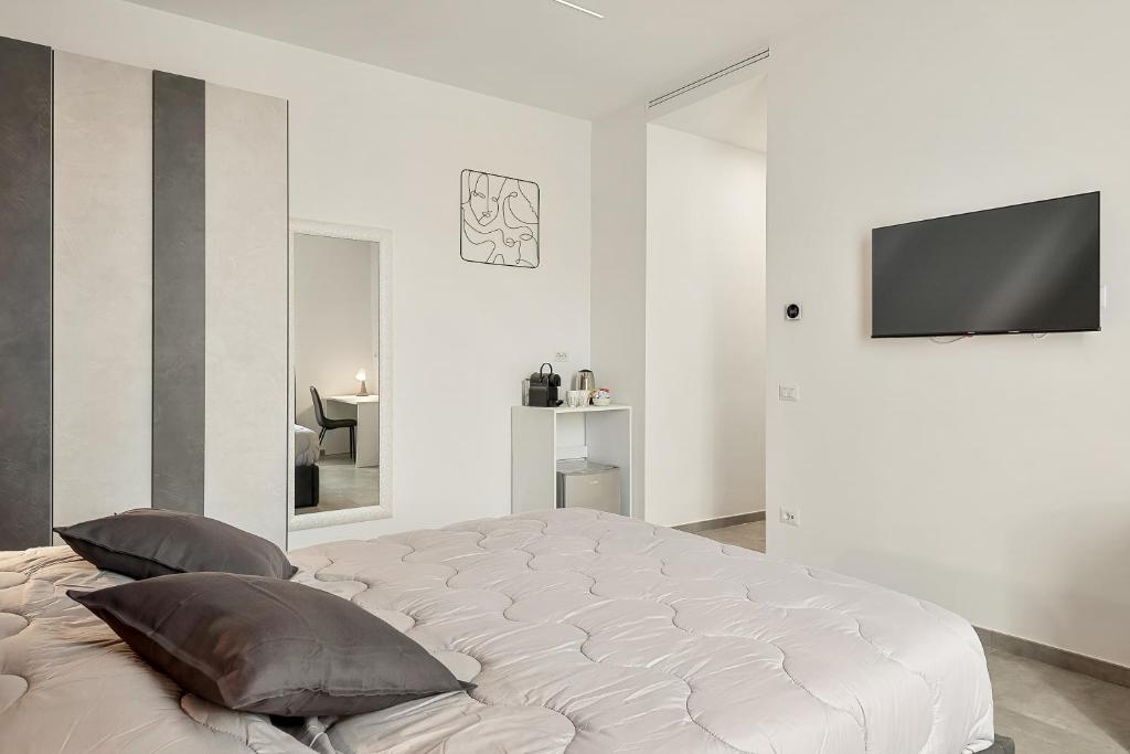 Postel nebo postele na pokoji v ubytování Home 501 Guest House - La Spezia